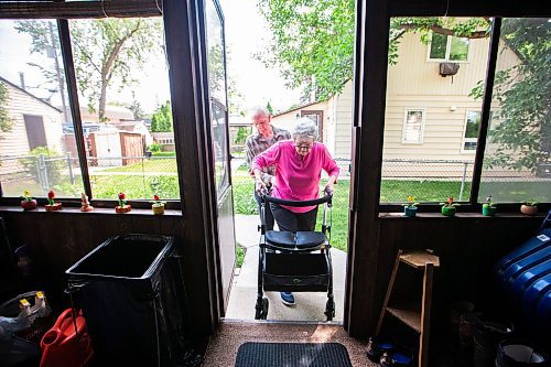 MIKAELA MACKENZIE / WINNIPEG FREE PRESS


Jim Hannah helps Cathy up the steps (in the walker that they have rented out-of-pocket) at their home on Wednesday, June 28, 2023.  Cathy has been forced to attempt her own rehab after the province denied her coverage for physiotherapy because she &quot;only&quot; received a partial hip replacement. For Malak Abas story.
Winnipeg Free Press 2023