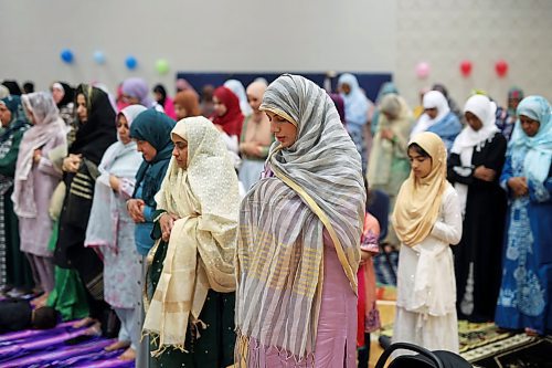 28062023
Members of southwestern Manitoba&#x2019;s Muslim community gathered at the Brandon University Healthy Living Centre on Wednesday for prayers and celebration in honour of Eid al-Adha - the feast of the sacrifice.  (Tim Smith/The Brandon Sun)