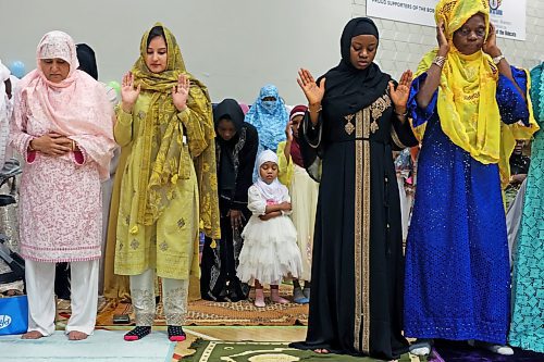 28062023
Members of southwestern Manitoba&#x2019;s Muslim community gathered at the Brandon University Healthy Living Centre on Wednesday for prayers and celebration in honour of Eid al-Adha - the feast of the sacrifice.  (Tim Smith/The Brandon Sun)