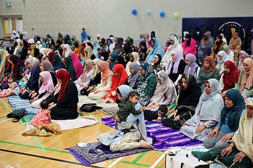 28062023
Rabia Malik, originally from Pakistan, holds her son Azlaan Awan during prayers with members of southwestern Manitoba&#x2019;s Muslim community gather at the Brandon University Healthy Living Centre on Wednesday in honour of Eid al-Adha - the feast of the sacrifice.  (Tim Smith/The Brandon Sun)