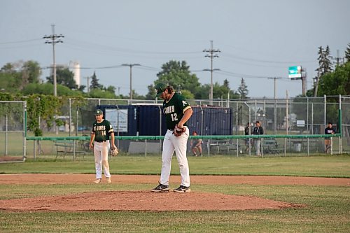 JESSICA LEE / WINNIPEG FREE PRESS

St. James A&#x2019;s pitcher Devon Cook gets ready to throw during a game against Elmwood Giants June 28, 2023 at Koskie Field.

Reporter: Joshua Frey-Sam
