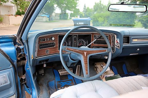 The steering wheel and dashboard in Norm Popien's 1973 Pontiac Parisienne Brougham four-door hardtop, in Brandon on Wednesday. (Michele McDougall/The Brandon Sun).