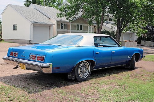 The passenger side from the rear of Norm Popien's 1973 Pontiac Parisienne Brougham four-door hardtop, in Brandon on Wednesday. (Michele McDougall/The Brandon Sun).