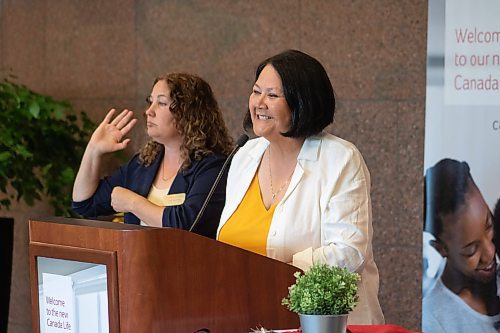 Mike Thiessen / Winnipeg Free Press 
Grand Chief Cathy Merrick of the Assembly of Manitoba Chiefs (right) speaking at the Canada Life press conference (with ASL interpreter Lauri Van Heyst). Canada Life has announced a $500k investment in Indigenous education at Red River College Polytechnic, including mentorship programming, which is set to help Indigenous education in Manitoba and beyond. For Tessa Adamski. 230629 &#x2013; Thursday, June 29, 2023