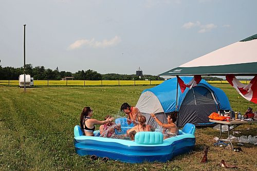 30062023
Campers relax in the campground at Dauphin&#x2019;s Countryfest 2023 on a hot Friday afternoon.
(Tim Smith/The Brandon Sun)