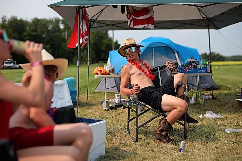 30062023
Campers relax in the campground at Dauphin&#x2019;s Countryfest 2023 on a hot Friday afternoon.
(Tim Smith/The Brandon Sun)