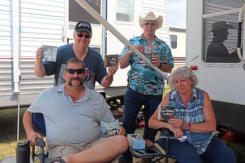 Some Dauphin’s Countryfest attendees highlight some of their favourite artists as they wait for Friday’s musical entertainment to begin. This CD collection included works from Dierks Bentley, who closed out Saturday’s show at the Play Now Main Stage. (Kyle Darbyson/The Brandon Sun)