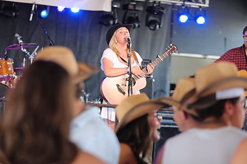 Artist Rhea Goertzen performs at the Bell Hilltop Stage during the first full day of Dauphin’s Countryfest 2023. This venue featured a variety of high-profile country music artists throughout Friday, including Quinton Blair, Emma Peterson, JR Charron and Cory Marks. (Kyle Darbyson/The Brandon Sun)