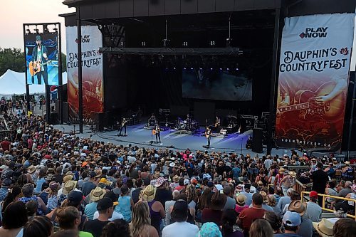 30062023
Tim Hicks performs for a large crowd on the main stage at Dauphin&#x2019;s Countryfest 2023 on Friday evening.
(Tim Smith/The Brandon Sun)

