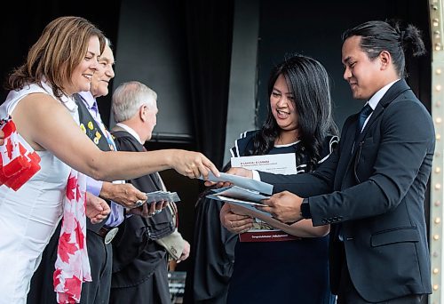 JESSICA LEE / WINNIPEG FREE PRESS

New Canadian citizens Angelica Revina and Victor Revina from the Philippines are welcomed by Premier Heather Stefanson at a citizenship ceremony July 1, 2023 at Assiniboine Park.

Reporter: Cierra Bettens