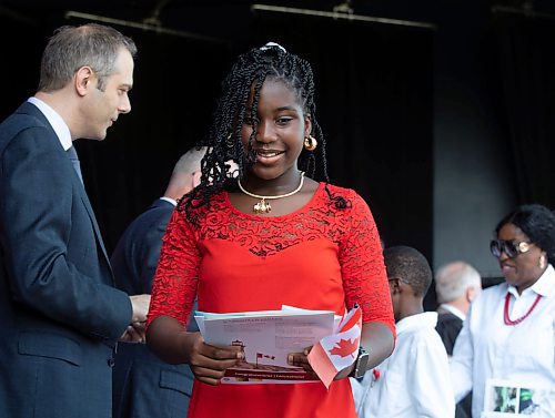 JESSICA LEE / WINNIPEG FREE PRESS

New Canadian citizen Oluwadamilola Adefusi grins after a citizenship ceremony July 1, 2023 at Assiniboine Park.

Reporter: Cierra Bettens