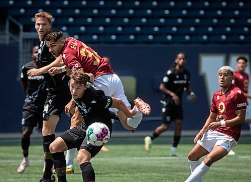 JESSICA LEE / WINNIPEG FREE PRESS

Valour FC player Jaime Romero (32) fights for the ball amidst Cavalry FC players during a game July 1, 2023 at IG Field.

Stand up