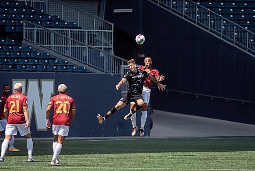 JESSICA LEE / WINNIPEG FREE PRESS

Valour FC and Cavalry FC players fight for the ball during a game July 1, 2023 at IG Field.

Stand up