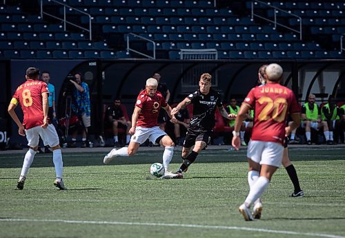 JESSICA LEE / WINNIPEG FREE PRESS

Valour FC and Cavalry FC players fight for the ball during a game July 1, 2023 at IG Field.

Stand up