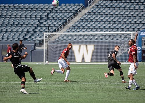 JESSICA LEE / WINNIPEG FREE PRESS

Valour FC and Cavalry FC players run for the ball during a game July 1, 2023 at IG Field.

Stand up