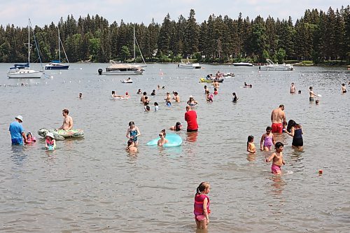 01072023
Beach-goers enjoy the sand and water at Clear Lake in Wasagaming during Canada Day celebrations at Riding Mountain National Park on Saturday.
(Tim Smith/The Brandon Sun)