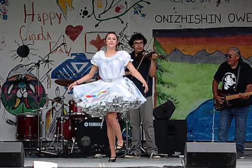 Shaylene Chartrand with Miss Sandi Bay and the Rainbow Tornadoes jigs for a large crowd in Wasagaming during Canada Day celebrations at Riding Mountain National Park on Saturday. (Tim Smith/The Brandon Sun)