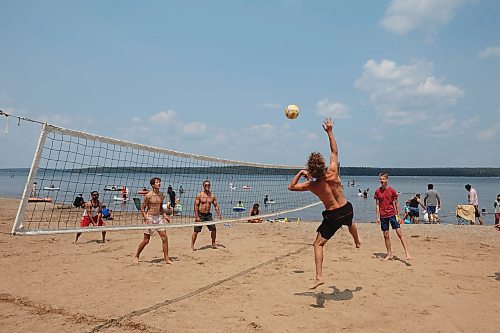 Beach-goers play volleyball at Clear Lake in Wasagaming during Canada Day celebrations at Riding Mountain National Park on Saturday. (Tim Smith/The Brandon Sun)