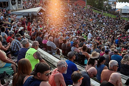 A large crowd watches Tim Hicks perform on the main stage at Dauphin’s Countryfest 2023 on Friday evening. (Tim Smith/The Brandon Sun)
