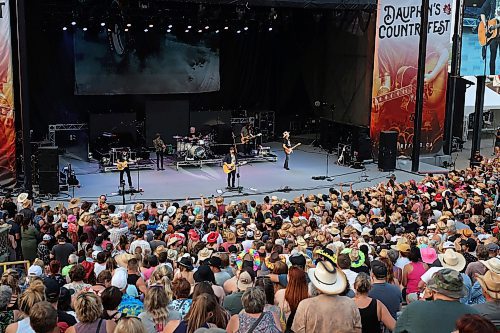 Tim Hicks performs for a large crowd on the main stage at Dauphin’s Countryfest 2023 on Friday evening. (Tim Smith/The Brandon Sun)
