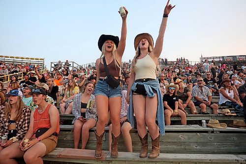 30062023
Julianna Herman and Alexis Marlow dance and cheer as Tim Hicks performs on the main stage at Dauphin&#x2019;s Countryfest 2023 on Friday evening.
(Tim Smith/The Brandon Sun)
