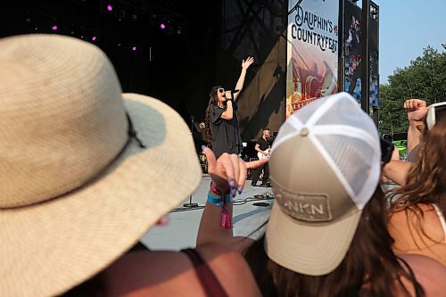 Fans watch as Robyn Ottolini performs on the main stage at Dauphin’s Countryfest 2023 on a hot Friday evening.
(Tim Smith/The Brandon Sun)