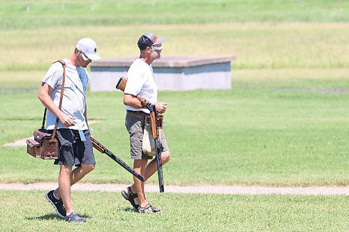 The Lamonts, son Patrick, left, and father Rob, walk to where they're shooting on Sunday afternoon during the Canadian Trapshooting Association's national championship at the Brandon Gun Club. The pair were able to share an emotional moment on Saturday evening when Patrick was inducted into the CTA Hall of Fame. (Perry Bergson/The Brandon Sun)
July 2, 2023