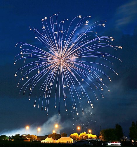 A massive blue firecracker explode in the skies over the Brandon Riverbank Discovery Centre on Saturday night, marking the end of Canada Day 2023 festivities in the city. (Matt Goerzen/The Brandon Sun)