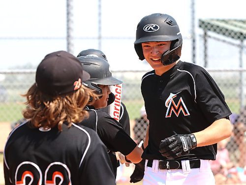 Reid Nicol of the Brandon Marlins celebrates his home run against South Central with his teammates in the 13-and-under bronze medal game at the Triple Crown Showdown at Simplot Millennium Park on Sunday afternoon. The Marlins won 5-3 in an extra inning. (Perry Bergson/The Brandon Sun)
July 3