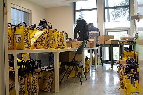 Tyler Crayston has commandeered the BU Athletics meeting room to store 280 tote bags for BIRT Cup participants after more than eight months of event planning. (Thomas Friesen/The Brandon Sun)