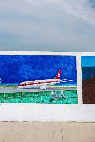 MIKAELA MACKENZIE / WINNIPEG FREE PRESS

A mural of the boys on their bikes is painted on the pier in Gimli on Monday, July 3, 2023. For Jen story.
Winnipeg Free Press 2023.