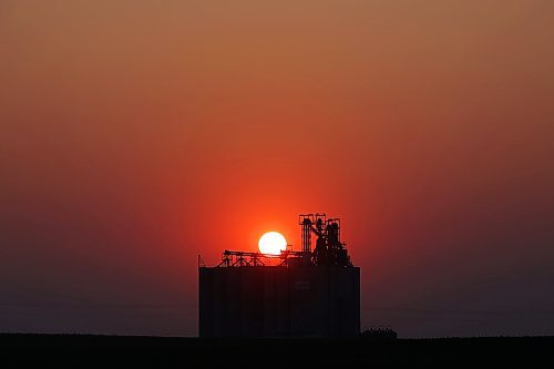 03072023
The sun sets west of a grain terminal near Boissevain, Manitoba on a warm and clear Monday evening. (Tim Smith/The Brandon Sun)