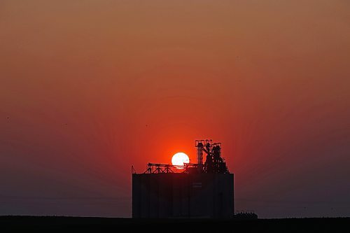 03072023
The sun sets west of a grain terminal near Boissevain, Manitoba on a warm and clear Monday evening. (Tim Smith/The Brandon Sun)