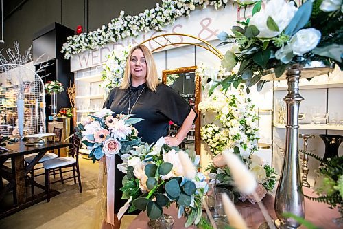 MIKAELA MACKENZIE / WINNIPEG FREE PRESS

Julie Myers, owner of Floral Fixx Design Studio, with silk flowers on Wednesday, July 5, 2023. Because of the higher cost of living and inflation, many brides are asking to rent silk flowers for dcor instead of buying fresh ones. For Gabby story.
Winnipeg Free Press 2023.