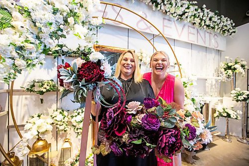 MIKAELA MACKENZIE / WINNIPEG FREE PRESS

Julie Myers, owner of Floral Fixx Design Studio (left), and her daughter Madison Myers with silk flowers on Wednesday, July 5, 2023. Because of the higher cost of living and inflation, many brides are asking to rent silk flowers for dcor instead of buying fresh ones. For Gabby story.
Winnipeg Free Press 2023.