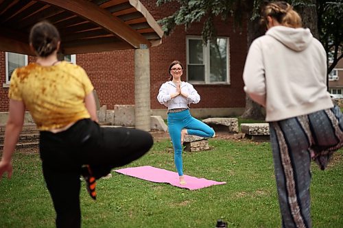 05072023
Olivia Boyce leads Yoga In The Park at Princess Park in Brandon on Wednesday. The weekly noon-hour yoga session is organized by the Brandon Neighbourhood Renewal Corporation. Their Rosser &amp; Around Downtown Ambassadors also host youth activities on Tuesdays and coffee in the park on Thursdays. (Tim Smith/The Brandon Sun)