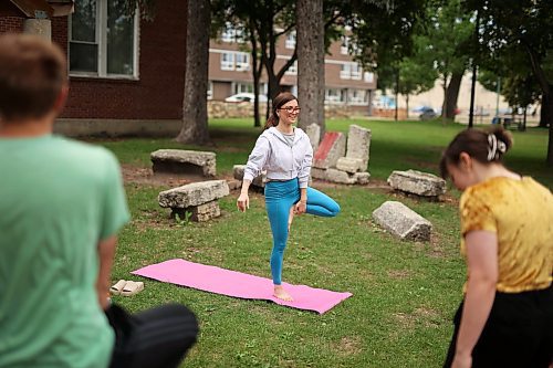 05072023
Olivia Boyce leads Yoga In The Park at Princess Park in Brandon on Wednesday. The weekly noon-hour yoga session is organized by the Brandon Neighbourhood Renewal Corporation. Their Rosser &amp; Around Downtown Ambassadors also host youth activities on Tuesdays and coffee in the park on Thursdays. (Tim Smith/The Brandon Sun)