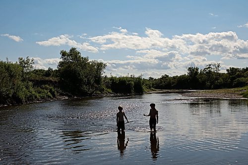 05072023
Octavius Egan and Cole Hartman explore the Little Saskatchewan River west of Brandon on a warm and sunny Wednesday afternoon.  (Tim Smith/The Brandon Sun)