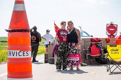 MIKAELA MACKENZIE / WINNIPEG FREE PRESS

Cambria Harris (left) and Melissa Robinson pose for a photo at the blockade/camp outside the Brady Landfill after the province announced that they will not be funding a landfill search for the murdered women on Thursday, July 6, 2023.  For Chris Kitching story.
Winnipeg Free Press 2023.