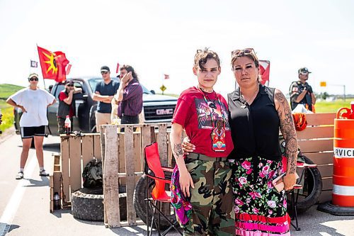 MIKAELA MACKENZIE / WINNIPEG FREE PRESS

Cambria Harris (left) and Melissa Robinson pose for a photo at the blockade/camp outside the Brady Landfill after the province announced that they will not be funding a landfill search for the murdered women on Thursday, July 6, 2023.  For Chris Kitching story.
Winnipeg Free Press 2023.