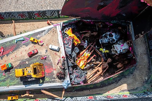 MIKAELA MACKENZIE / WINNIPEG FREE PRESS

A model of the landfill, filled with bodies and body parts, at the blockade/camp after the province announced that they will not be funding a landfill search for the murdered women on Thursday, July 6, 2023.  For Chris Kitching story.
Winnipeg Free Press 2023.