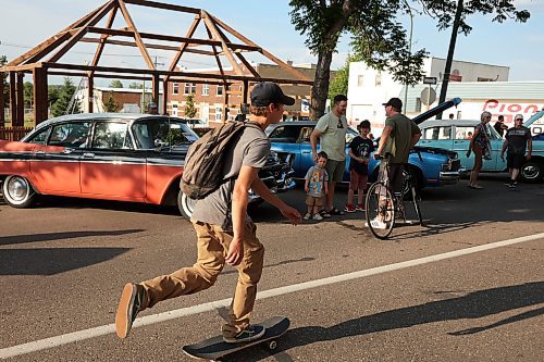 06072023
Brandonites and westman residents took in the Brandon and Area Car Enthusiasts (BACE) Cruise Night in Downtown Brandon on a sunny Thursday evening, checking out all the vehicles on display. 
(Tim Smith/The Brandon Sun)