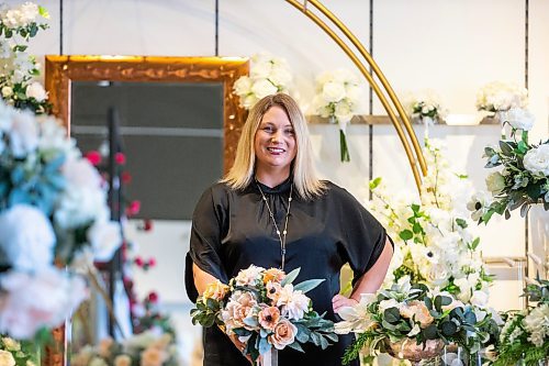 MIKAELA MACKENZIE / WINNIPEG FREE PRESS

Julie Myers, owner of Floral Fixx Design Studio, with silk flowers on Wednesday, July 5, 2023. Because of the higher cost of living and inflation, many brides are asking to rent silk flowers for dcor instead of buying fresh ones. For Gabby story.
Winnipeg Free Press 2023.