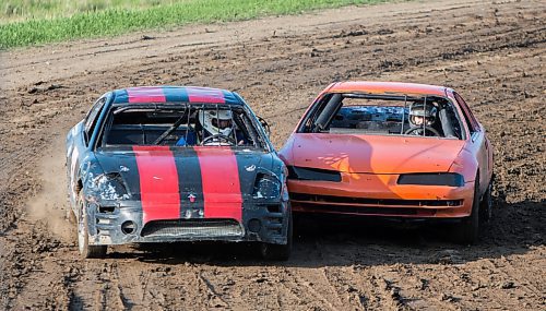 Shawn McPhail, left, and Dave Dickenson make contact during the opening race of the 2019 PASCAR season. Racing hasn't taken place at the Souris Glenwood Airport facility since the COVID-19 pandemic. (Brandon Sun file)