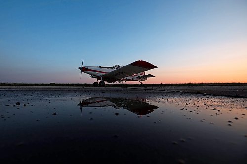 07072023
John Lepp with Rivers Air Spray prepares for take off in his Air Tractor AT-802F at the former CFB Rivers base near Wheatland, Manitoba at the start of a busy day of aerial fungicide application at sunrise on Friday. 
(Tim Smith/The Brandon Sun)