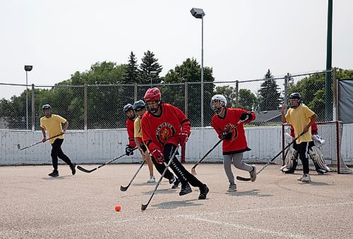 JESSICA LEE / WINNIPEG FREE PRESS

Nisichawayasihk Cree Nation Flames player Silas Swanson, 17, (centre) plays against a team from Pukatawagan July 8, 2023 at Norberry-Glenlee Community Centre for the Indigenous Vitality Ball Hockey Tournament which brought in several teams over the weekend to play against each other.

Reporter: Mike McIntyre
