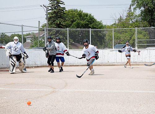 JESSICA LEE / WINNIPEG FREE PRESS

Manto Sipi Cree Nation Icebreakers player Leo Yellowback, 15, (second from right) is photographed during a game against a team from Barren River July 8, 2023 at Norberry-Glenlee Community Centre for the Indigenous Vitality Ball Hockey Tournament. The tournament brought in several teams over the weekend to play against each other.

Reporter: Joshua Frey-Sam