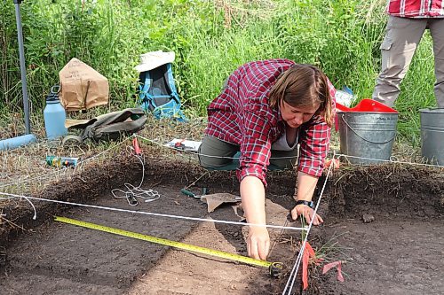 Brandon University student Charlotte Stein helps excavate an archaeological dig site located right next to Gainsborough Creek on Saturday morning. (Kyle Darbyson/The Brandon Sun)