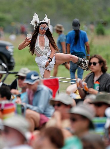 JOHN WOODS / WINNIPEG FREE PRESS
Brittany Roginson balances on one leg as she hula-hoops  at the Winnipeg Folk Festival in Birds Hill Park Sunday, July 9, 2023.