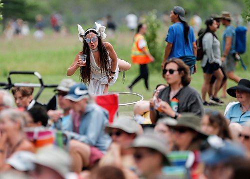 JOHN WOODS / WINNIPEG FREE PRESS
Brittany Roginson balances on one leg as she hula-hoops  at the Winnipeg Folk Festival in Birds Hill Park Sunday, July 9, 2023.